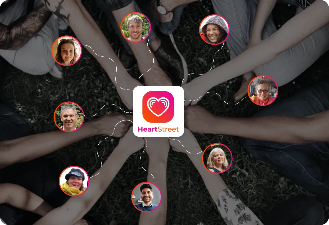 A group of people holding hands in a circle