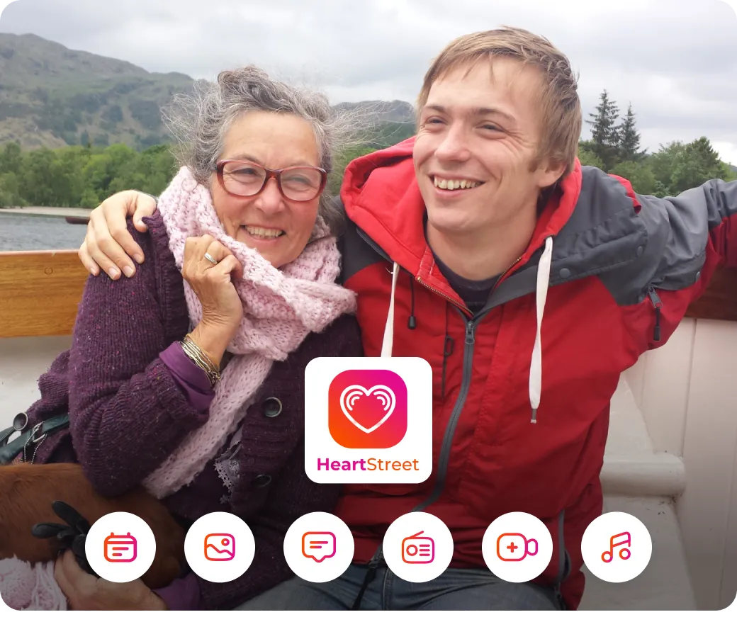 A man and woman taking a selfie on a boat